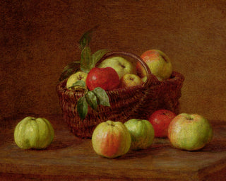 APPLES IN A BASKET ON A TABLE