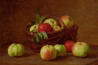 APPLES IN A BASKET ON A TABLE